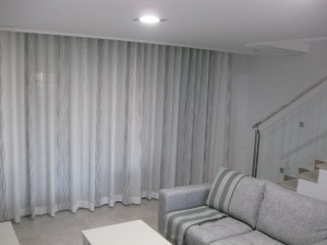 Eyelet curtains in cool greys